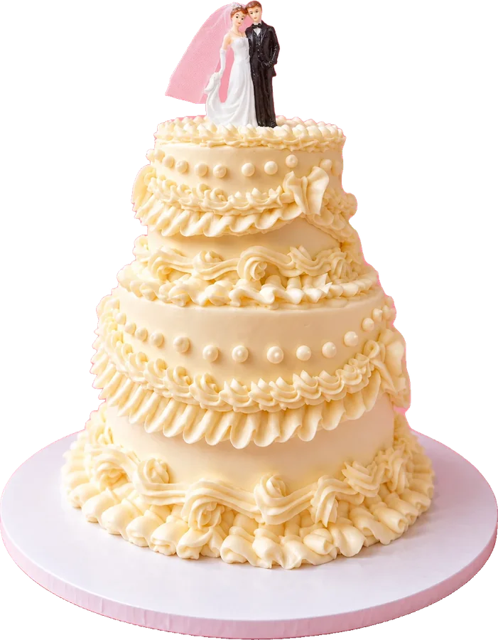 Our mini wedding cake: ivory buttercream ruffles and a bride and groom on top
