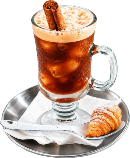 Café Carajillo over ice with a cinnamon stick