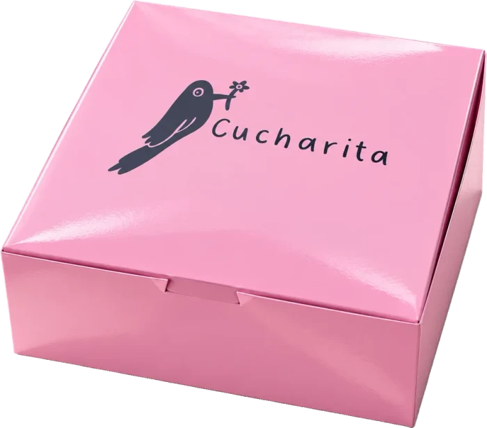 Cucharita’s pink to-go box with the bird logo