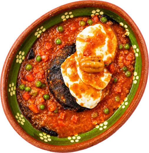 Huevos motuleños in red salsa